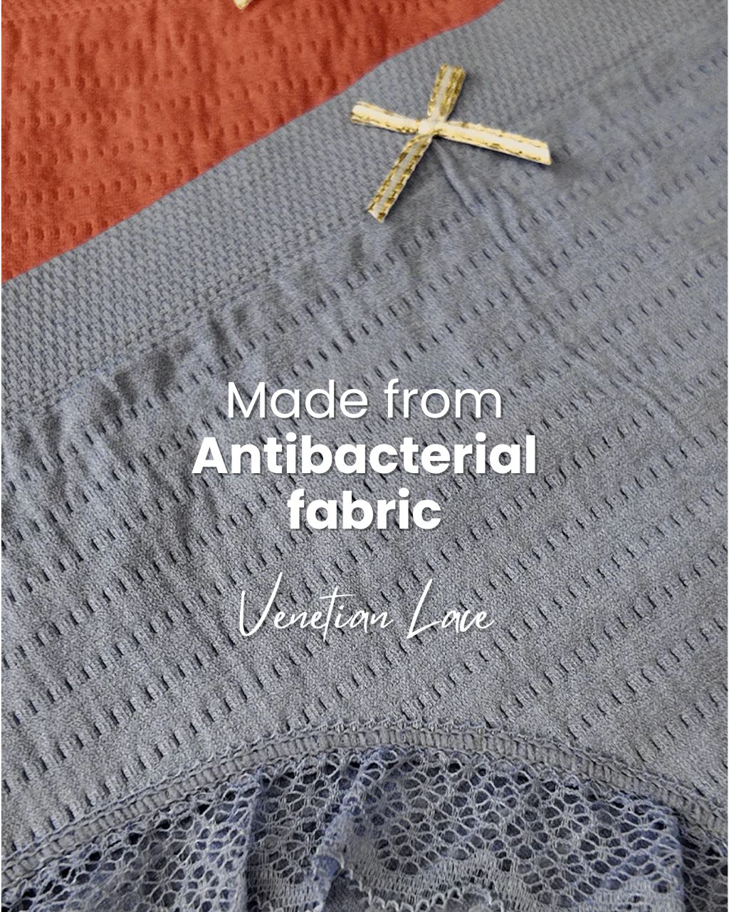 A single green leaf against a white background.