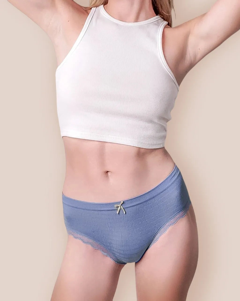 A single green leaf against a white background.