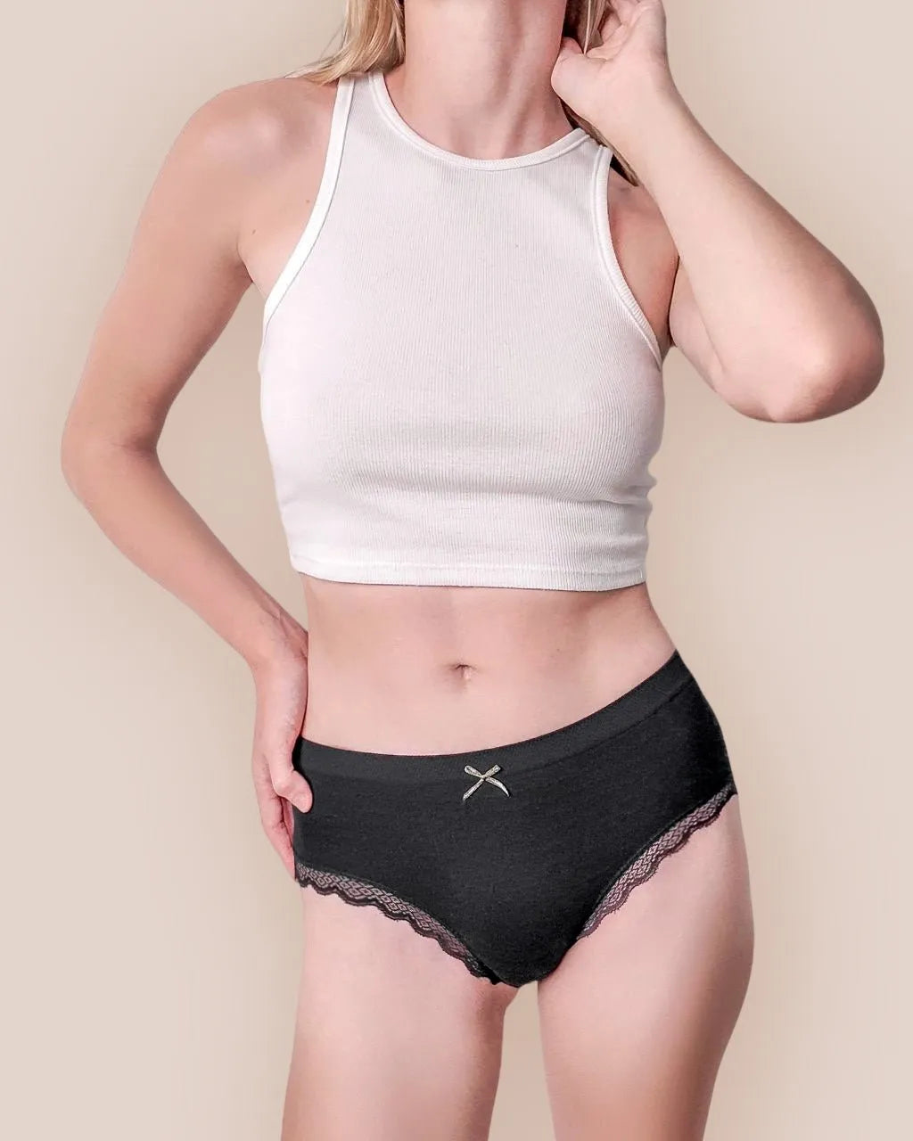 A single green leaf against a white background.